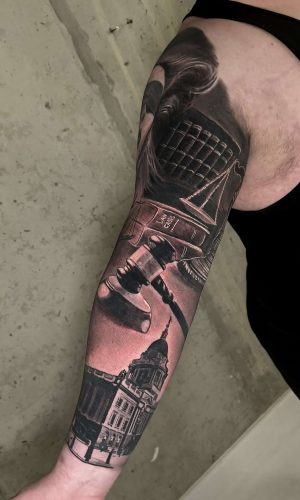 lady justice and old bailey full sleeve inner arm tattoo best london artist