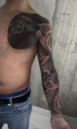 lady roses, gorilla and skull full sleeve tattoo london uk artist black and grey realism. cover up tattoos
