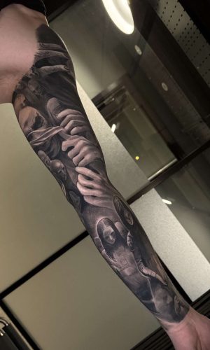 dark creepy black and grey middle inner area tattoo full sleeve london best artist